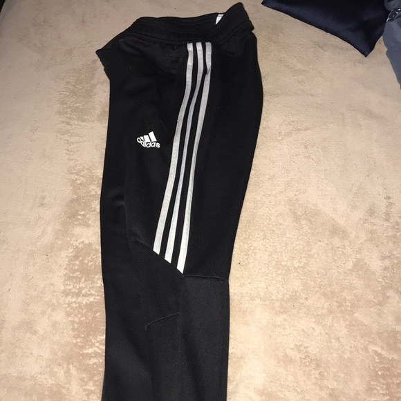 half striped adidas joggers